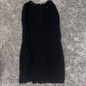 Small long sleeved black lace dress